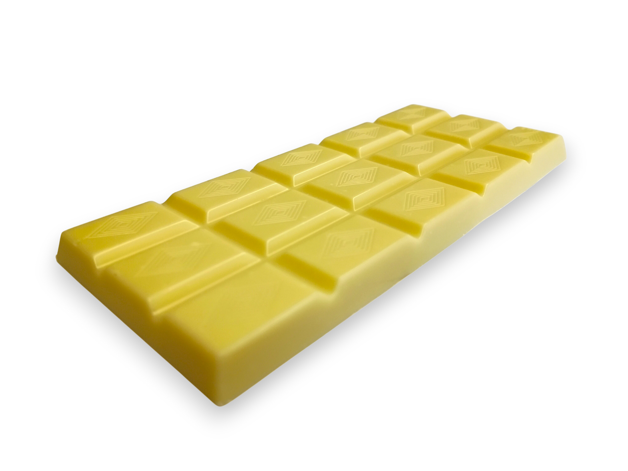 A creamy NZ white chocolate bar by Wayne Raven with diamond shapes on it