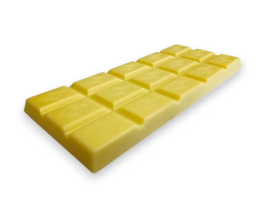 A creamy NZ white chocolate bar by Wayne Raven with diamond shapes on it
