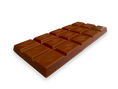 Load image into Gallery viewer, New Zealand darker milk chocolate bar close up by Wayne Raven Chocolate Maker
