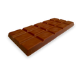 Load image into Gallery viewer, Unwrapped close up of a Wayne Raven darker milk chocolate bar 
